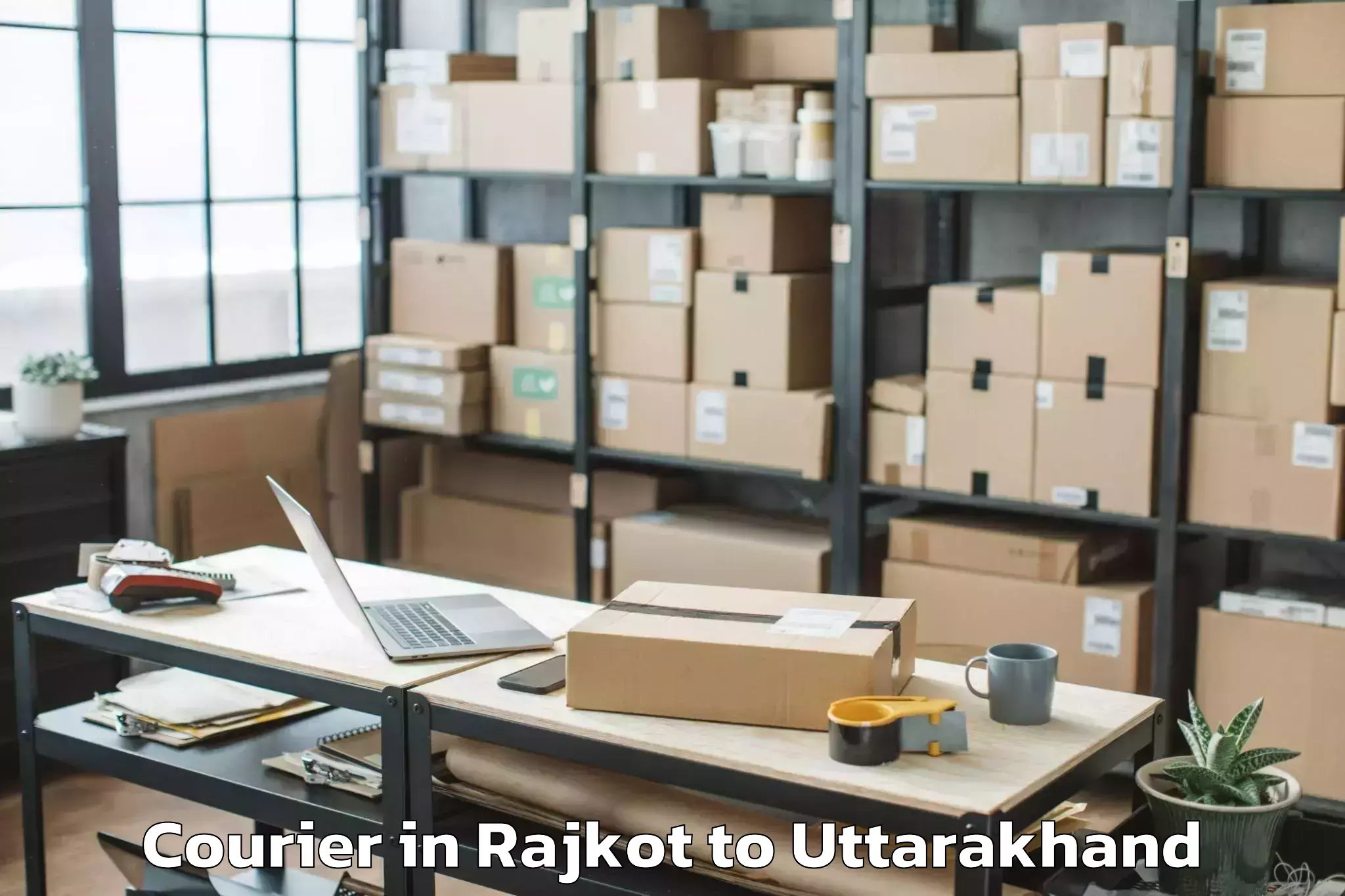 Top Rajkot to Gairsain Courier Available